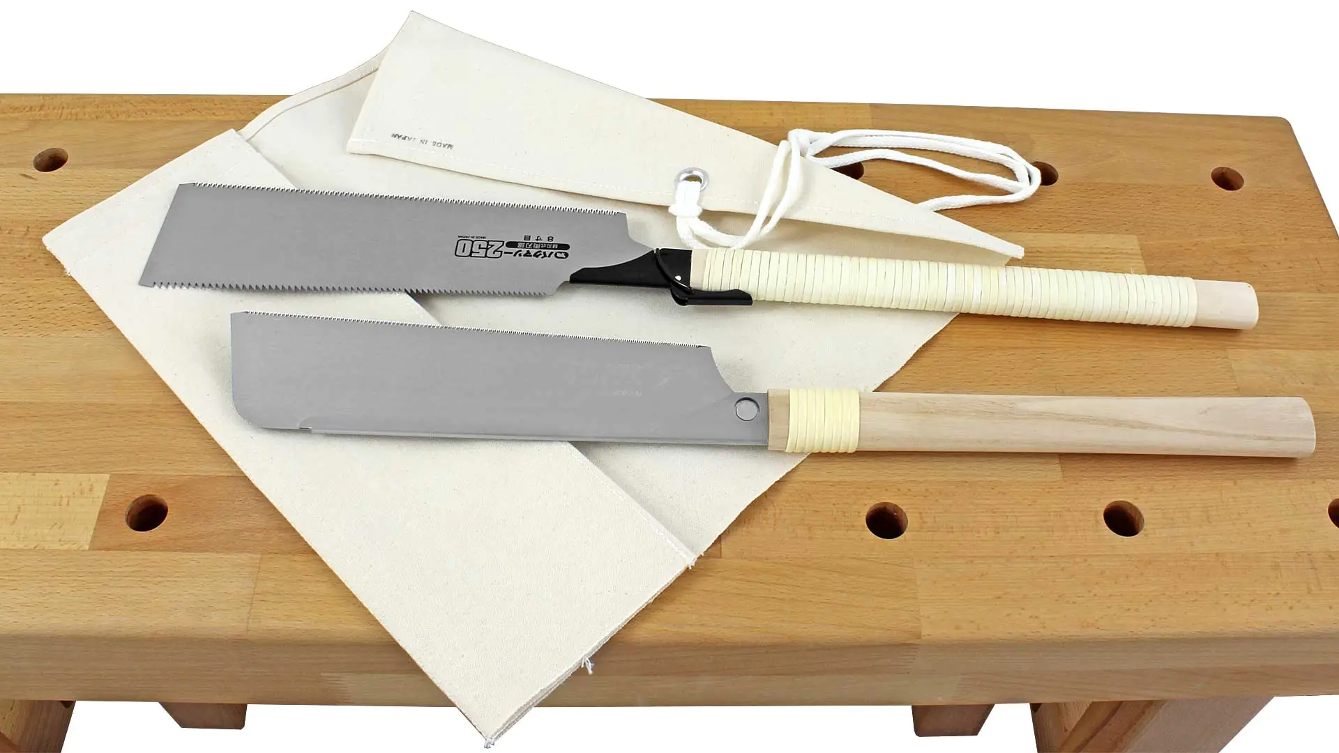 Set di 2 seghe giapponesi consistente di Ryoba 309310 - Dozuki 309325 e custiodia in tessuto naturale 309858
