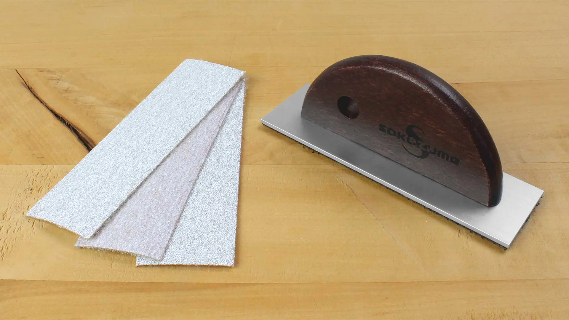 Tampone per levigatura 100 x 30 mm con manico con attacamento in velcro e 3 fogli abrasivi